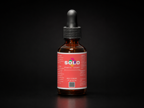 Coconut scented beard oil in a 2oz dropper bottle.